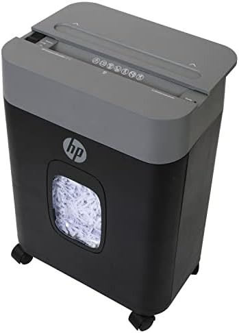Cross cut shredder with pullout basket