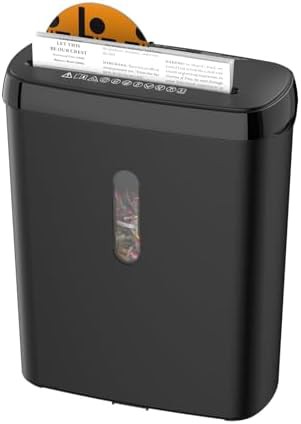 Ten sheet strip cut shredder with twelve liter basket